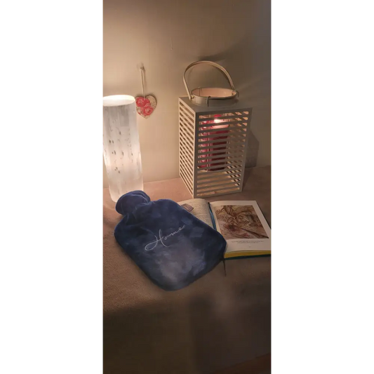 Wooden lantern with slatted sides and handle, perfect for Fashy Hot Water Bottles