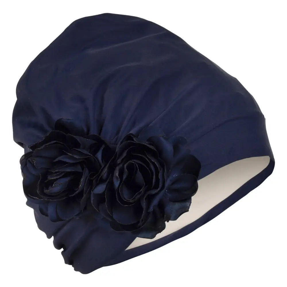 navy swim turban by Fashy. With large decorative flower. Fine Saratoga UK